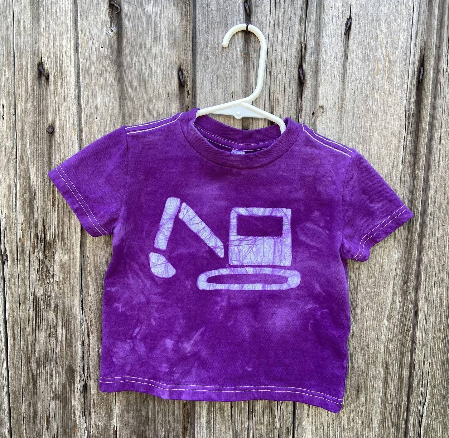 peace baby batiks excavator