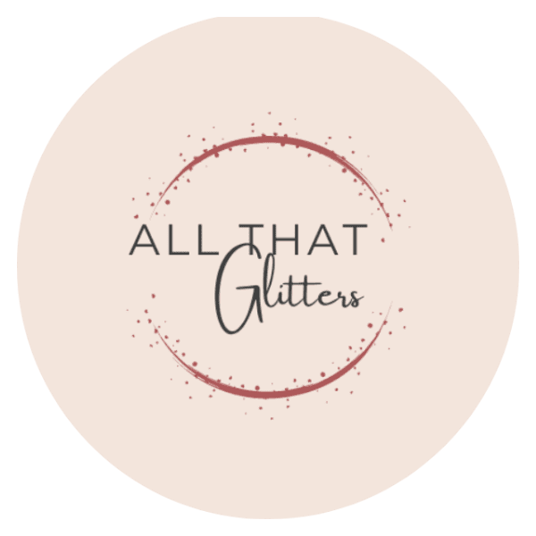 All That Glitters logo on pink background