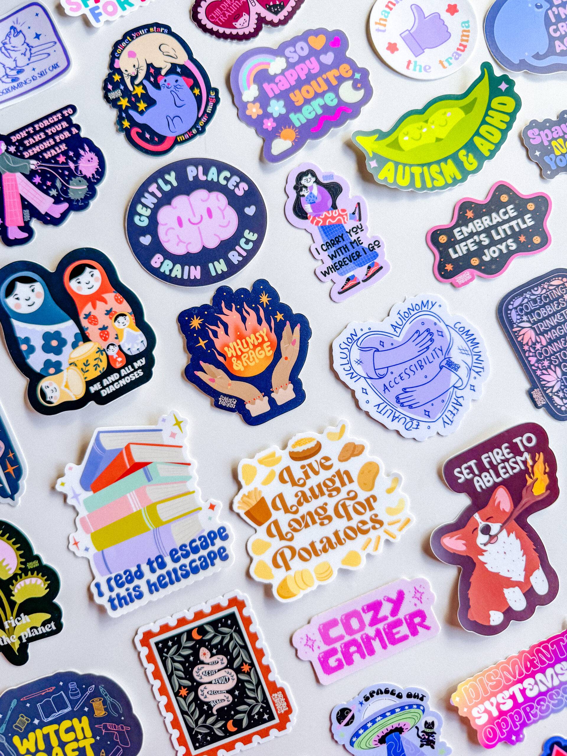 Vinyl stickers laid out on a flat white background