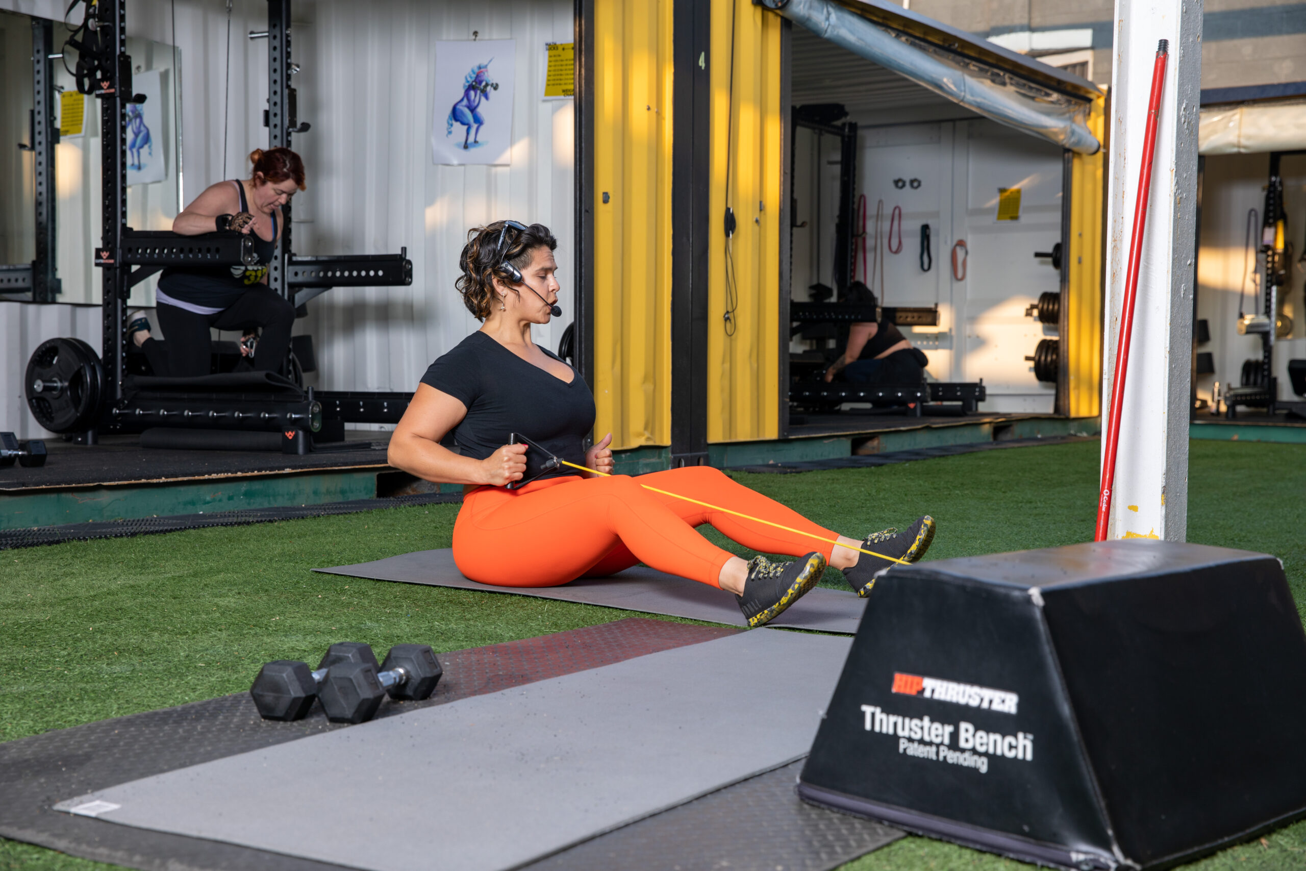 Each person has their own container while Trainer demos exercises.