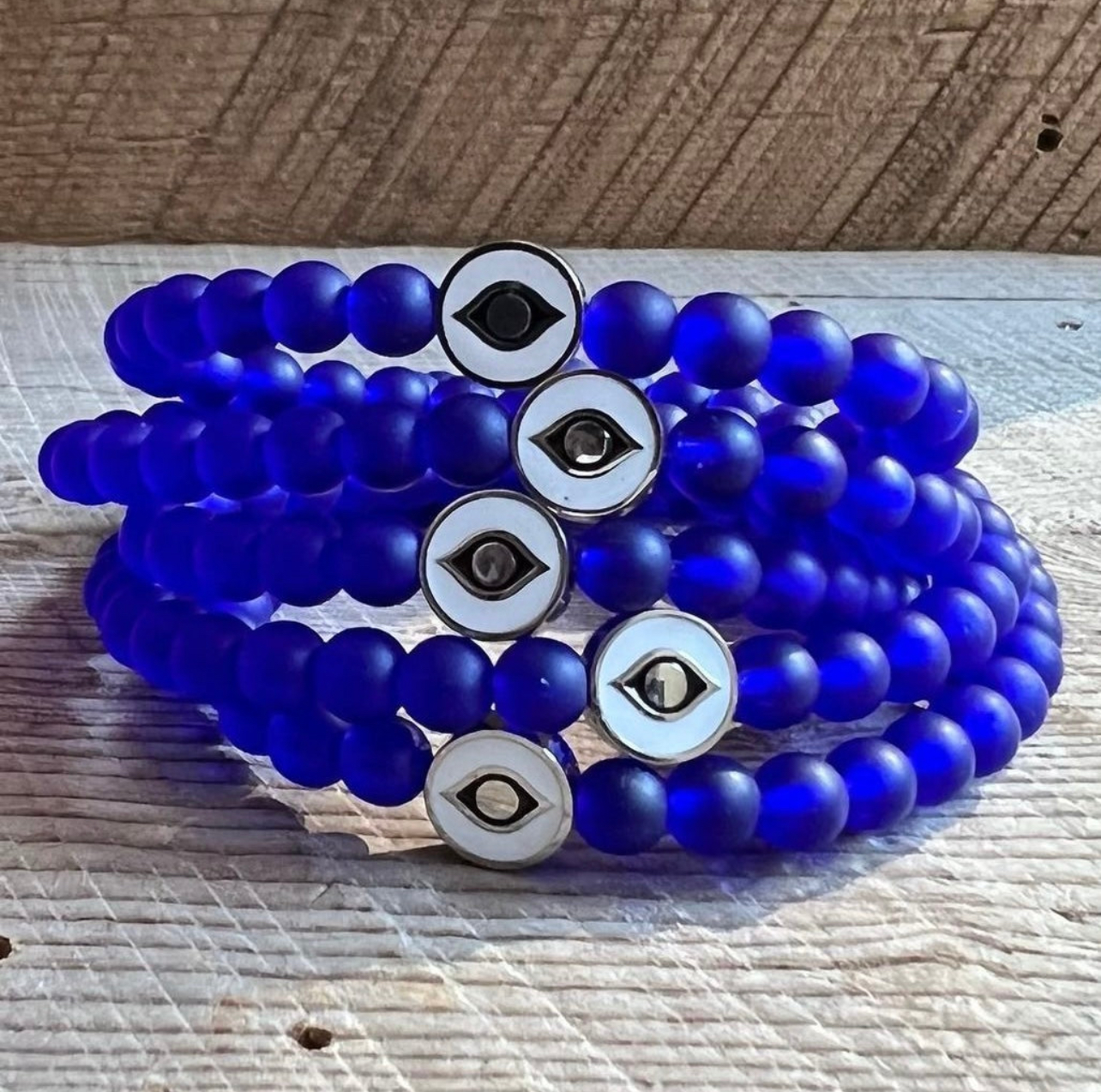 SariBlue® Protect Your Energy Evil Eye Bracelet These 6mm cobalt blue glass beads have definitely become one of my favorites to work with. Paired with the stainless steel protective evil eye slides you have a beautiful, everyday bracelet to reject negative vibes and protect your energy.
