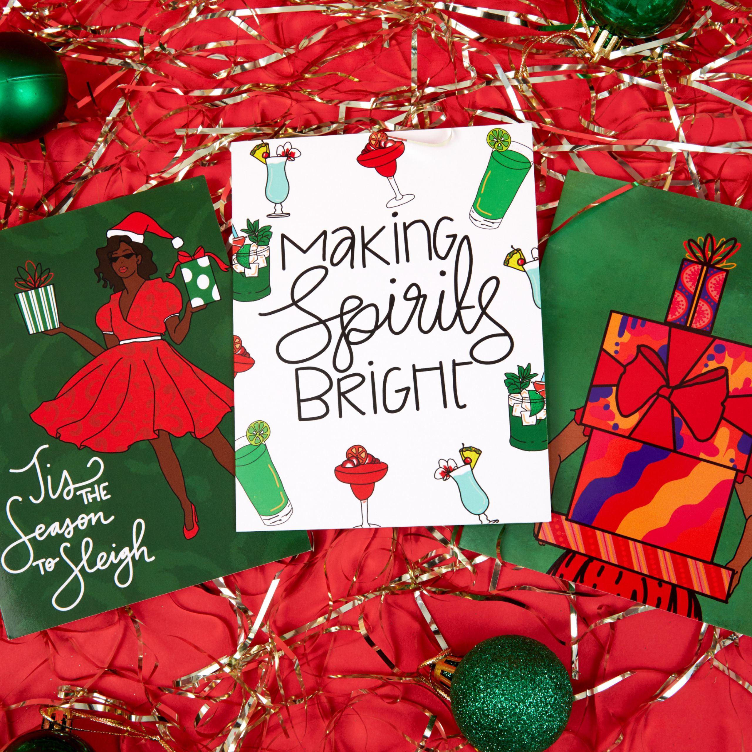 Making Spirits Bright and Tis the Season to Slay original greeting cards by Pretty Peacock Paperie