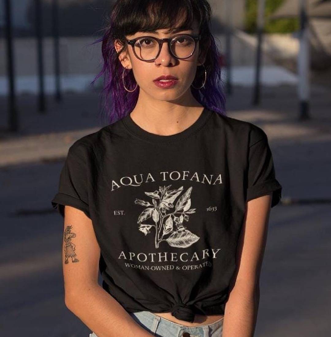 Model wearing the original Aqua Tofana Apothecary shirt by Salty Fox Prints