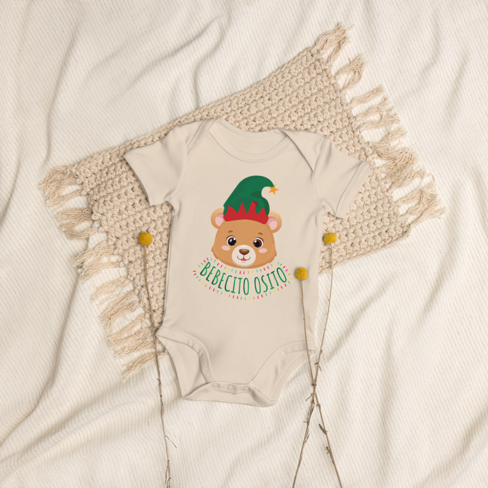 Soft white infant bodysuit featuring a cute brown bear illustration with the words ‘Bebecito Osito’ in playful lettering.