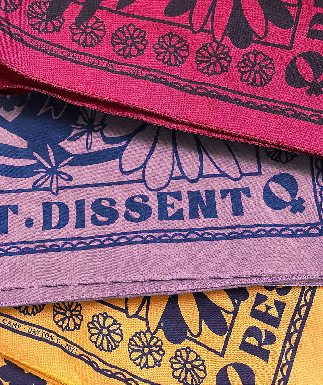 Sugar Camp 'Resist, Persist, Dissent' Bandanas stack in pink, gold and burgundy
