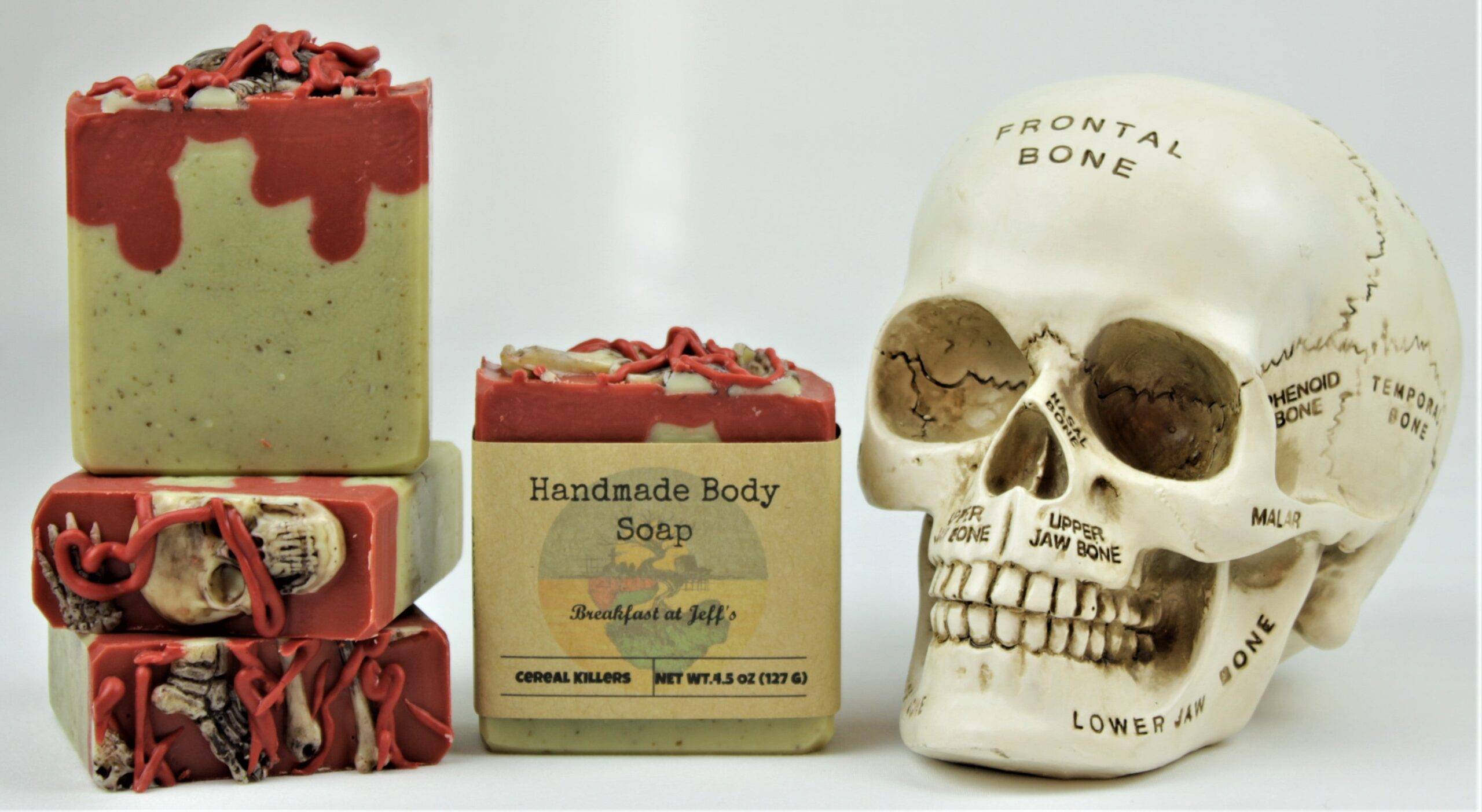 Display of Breakfast at Jeff's soaps, white with blood drips, topped with soap skeleton bones.