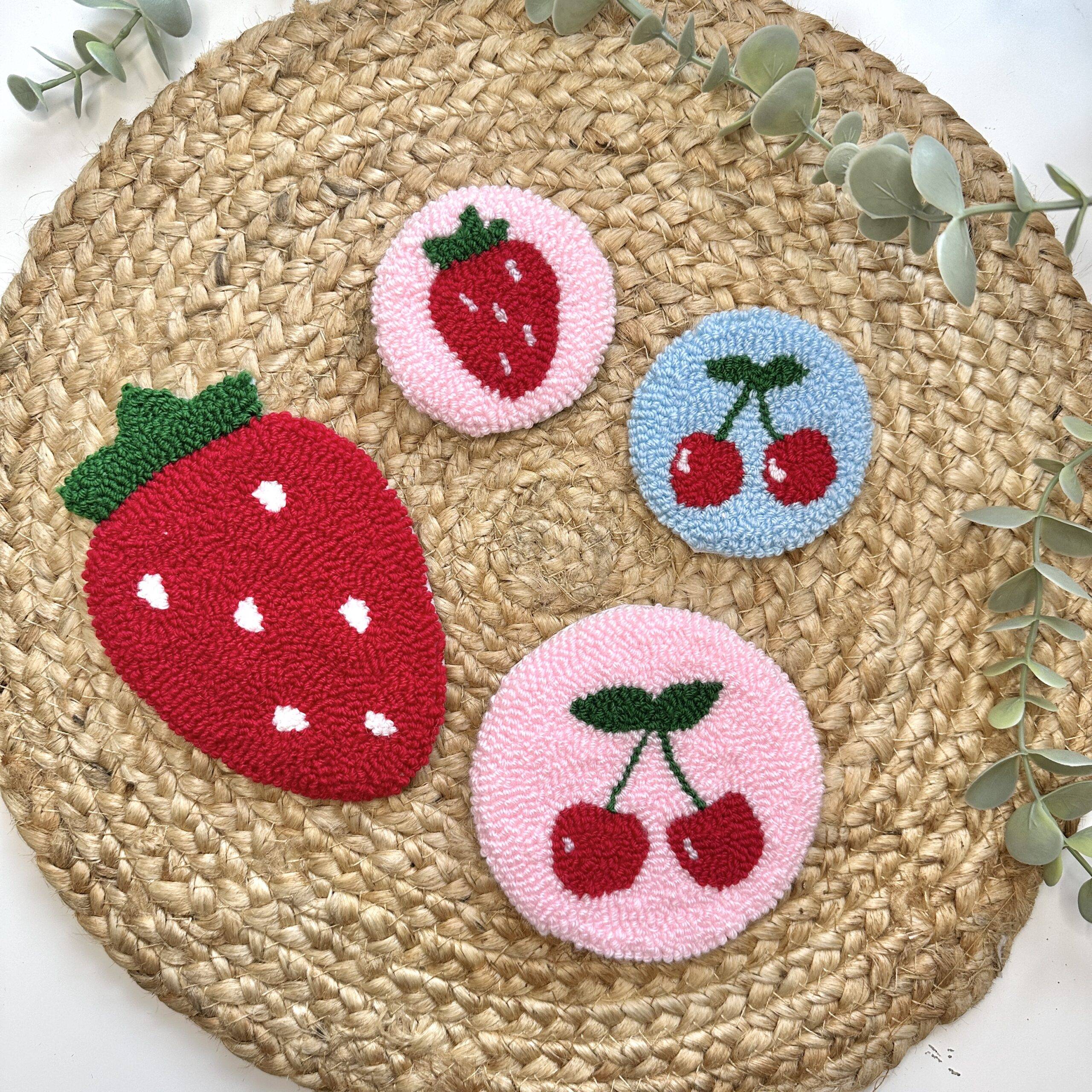 handtufted coasters featuring strawberry and cherry designs