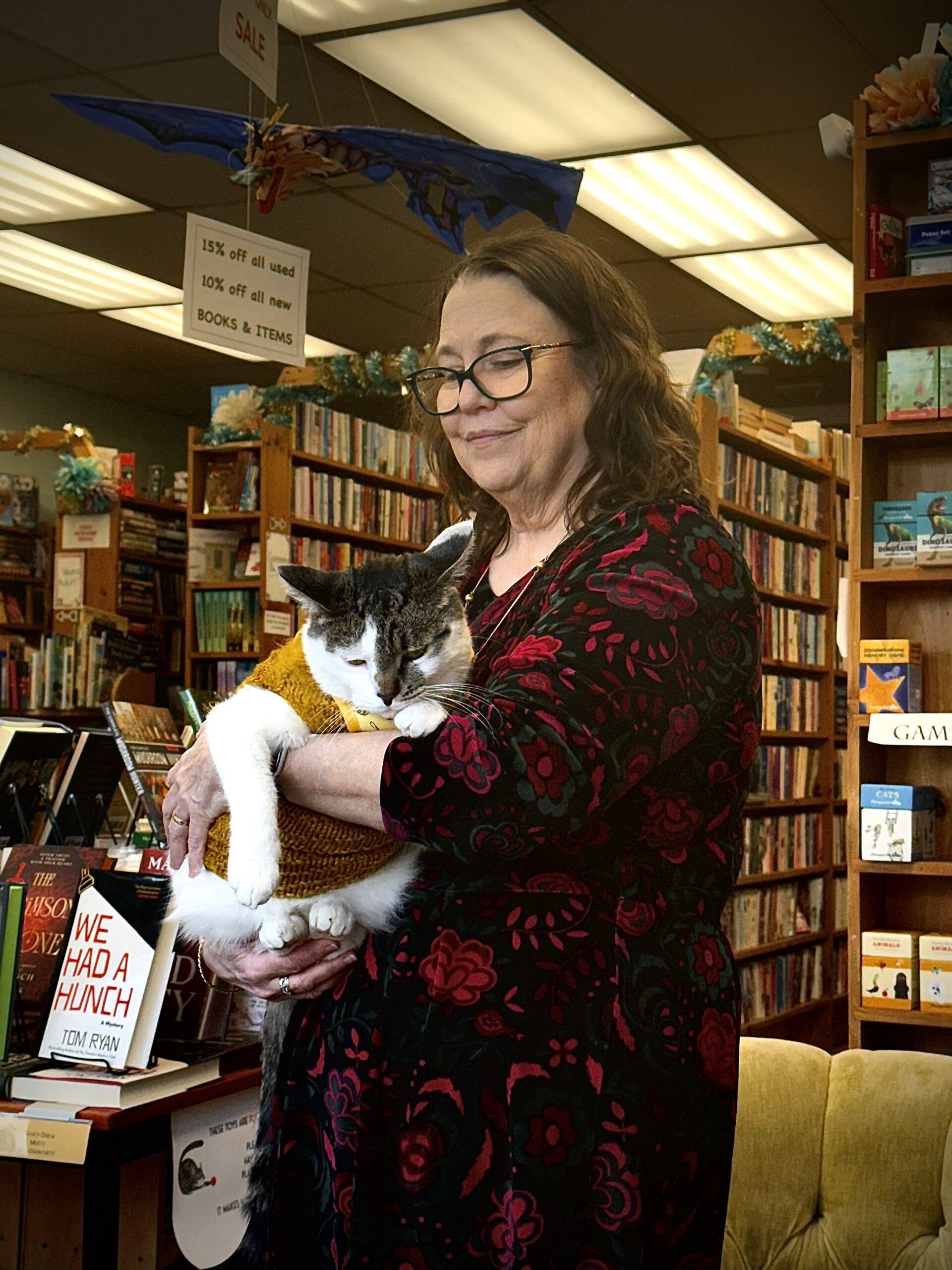 owner Nancy Carter Hanger with Wesley the bookstore cat