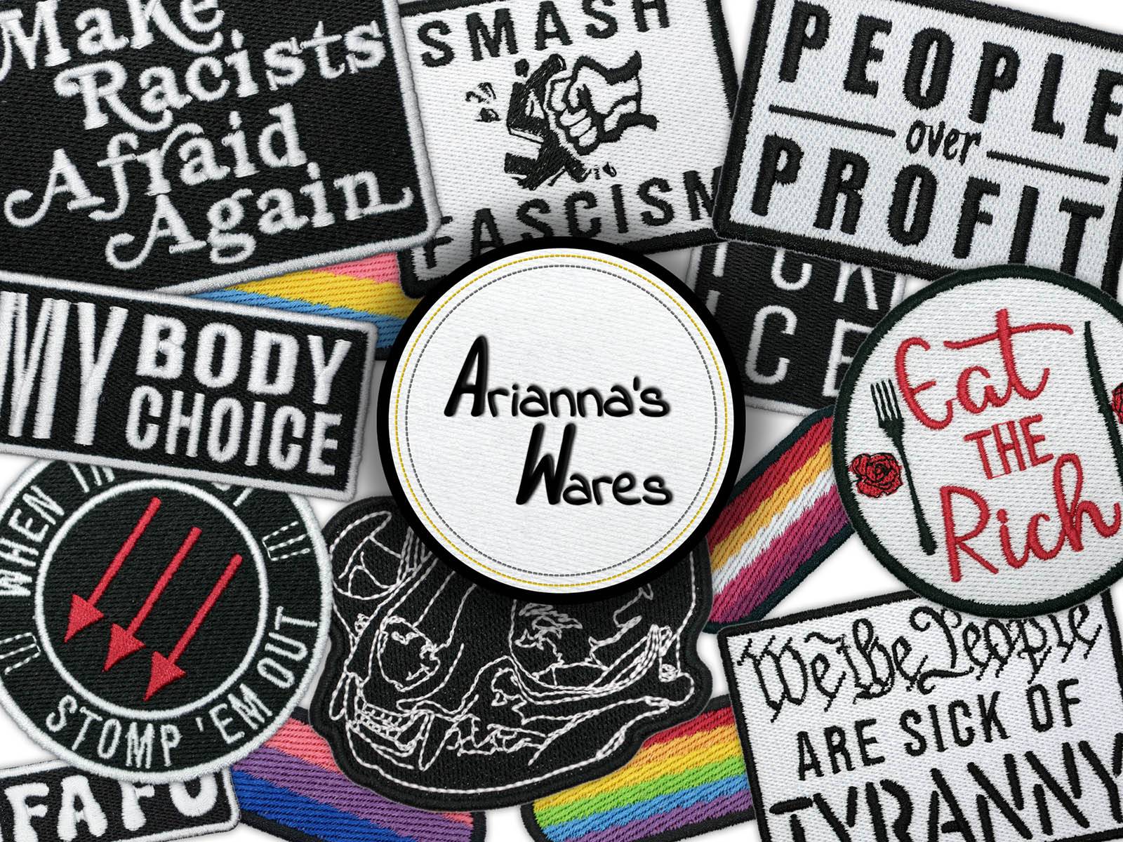 A display of various machine embroidered patches, including activist/left-leaning political patches, pride flag patches, and artistic patches, with the logo of Arianna's Wares on top of all of them.